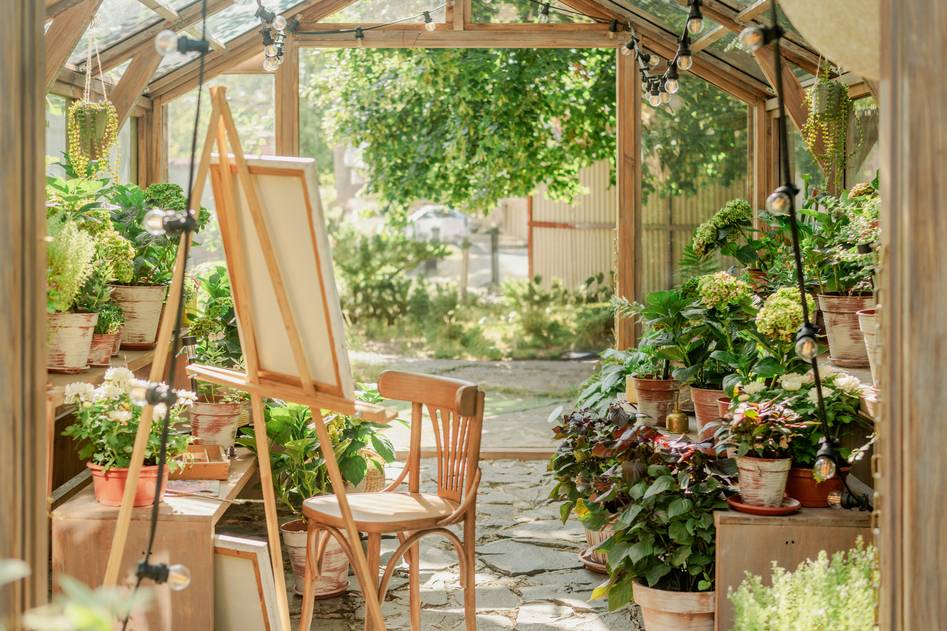 Wooden garden chair in lush backyard setting